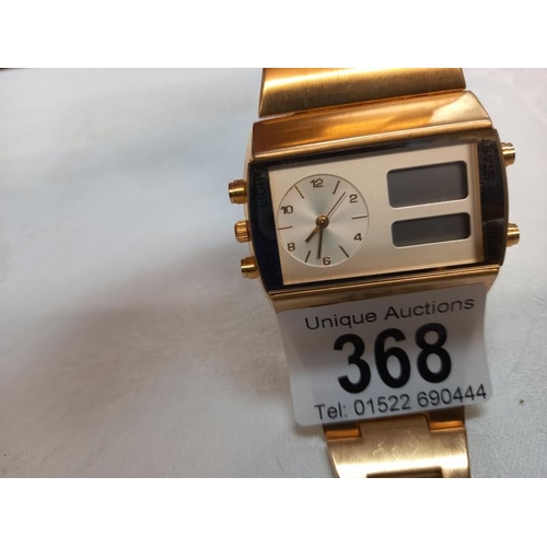 368 - A large gold plated gents SofTech London digital analogue wrist watch