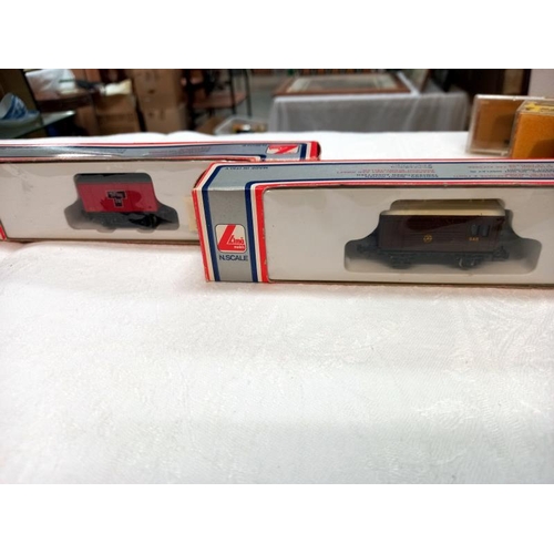 377 - A quantity of boxed N gauge goods wagons including Lima Hornby miniature etc.