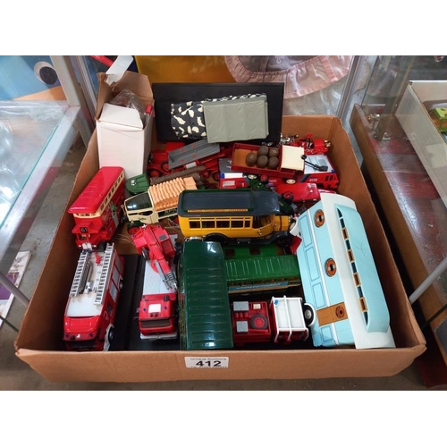 412 - A selection of boxed Diecast fire engines and commercial vehicles including Corgi.