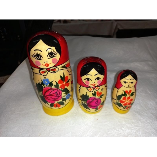 415 - A set of Matryoshka dolls and hand painted wooden jar. Made in Russia.