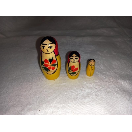 415 - A set of Matryoshka dolls and hand painted wooden jar. Made in Russia.