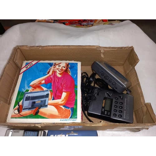 429 - A quantity of 1980's personal stereos including Sony Walkman boxed Lloytron W135 and Ferguson escort... 