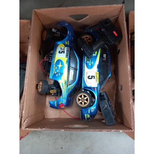 438 - 3 boxes of radio control cars. Collect Only.