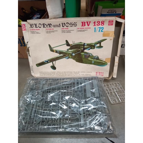 440 - A quantity of plastic model kits including Airfix & Revell etc in part used condition, completeness ... 