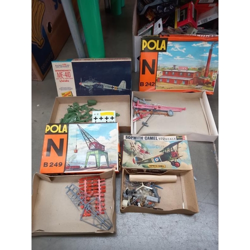 440 - A quantity of plastic model kits including Airfix & Revell etc in part used condition, completeness ... 