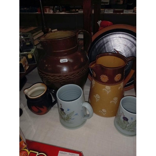 445 - A good selection of stoneware jugs, mixed porcelain etc including Royal Doulton. Collect Only.