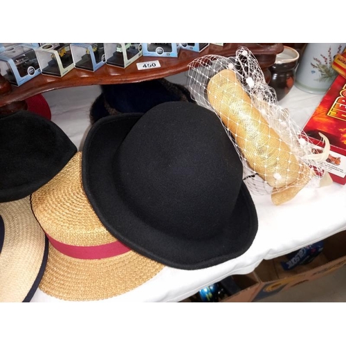 451 - A 19th/20th Century mushroom wooden hat stand and a quantity of vintage ladies hats. ( heads not inc... 