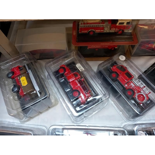 471 - A quantity of Diecast fire engine models in original packaging by various makers.