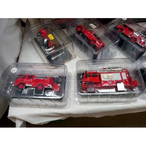 471 - A quantity of Diecast fire engine models in original packaging by various makers.