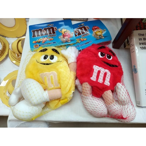 473 - A selections of M&M's merchandise memorabilia including rucksacks, calculator etc.