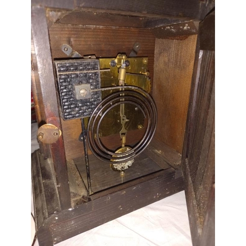 499 - An Edwardian mantle clock with silvered dial, with pendulum, no key, both springs ok. Collect Only.