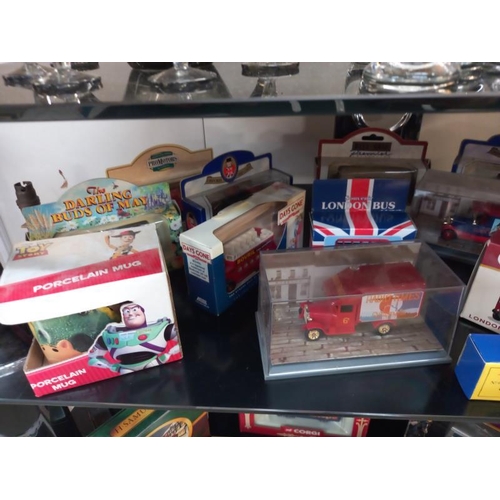 502 - A mixed collection over 3 shelves, of boxed Diecast including Lledo and Matchbox etc. (Some in the w... 