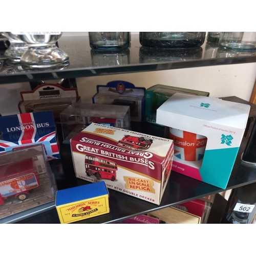 502 - A mixed collection over 3 shelves, of boxed Diecast including Lledo and Matchbox etc. (Some in the w... 