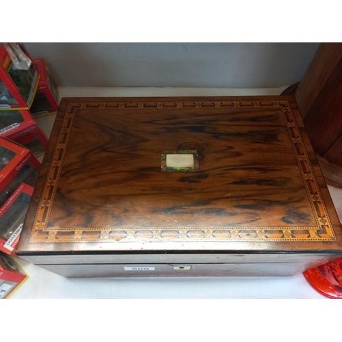 509 - A good Victorian mahogany writing slope with ink bottles.