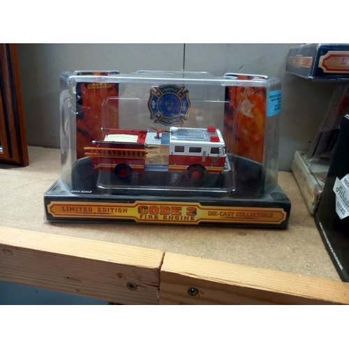 521 - 3 limited edition code 3 fire engines and 1 other.