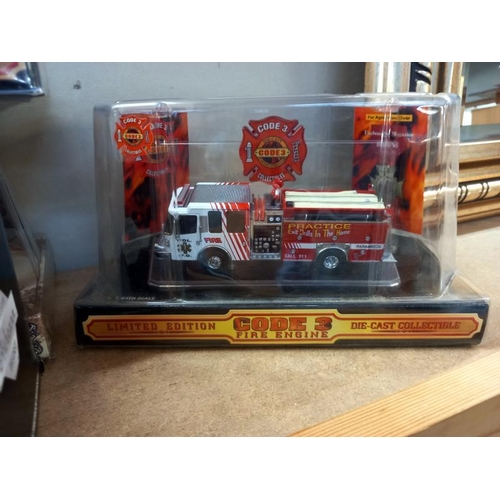 521 - 3 limited edition code 3 fire engines and 1 other.