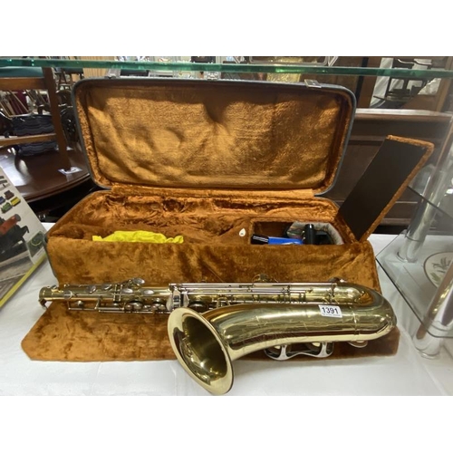 1391 - A corton saxophone with case.