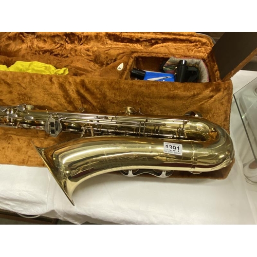 1391 - A corton saxophone with case.