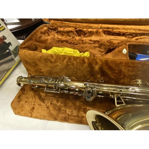 1391 - A corton saxophone with case.