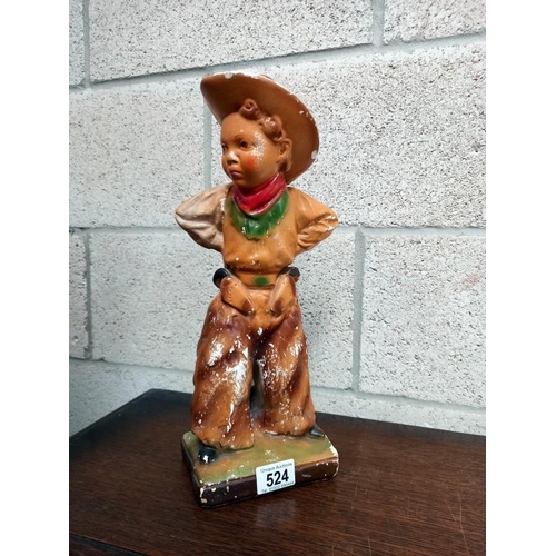 524 - A 1930's Chalk figure of a cowboy child. Height 39cm A/F