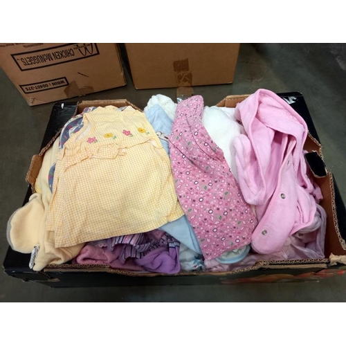 541 - 4 boxes of manly girls baby clothes, mostly between 3-6 months and 6-9 months and shoes etc.