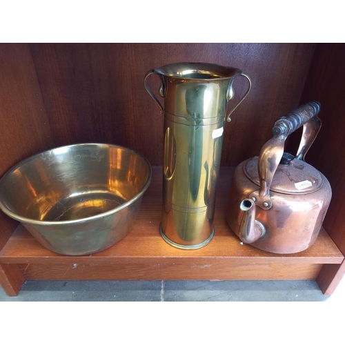 546 - Brassware including toasting forks, shells case, horse brasses etc, 3 shelves.