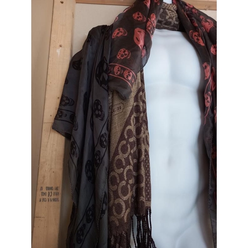 561 - A Luke Eyres scarf (New), 2 skull scarves, a Sax Fifth Avenue scarf etc ( hangers included).