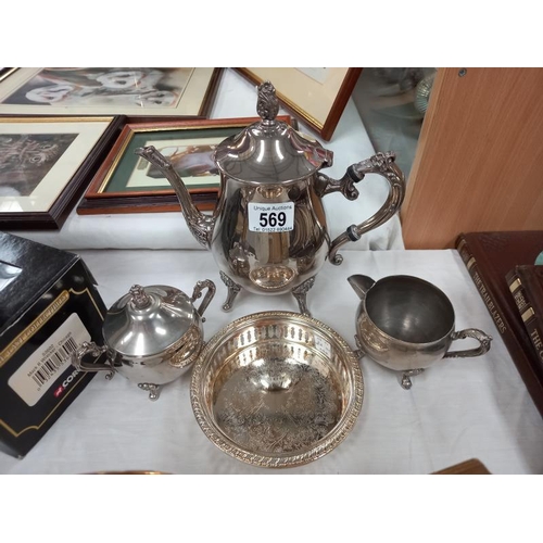 569 - A silver plated tea set.