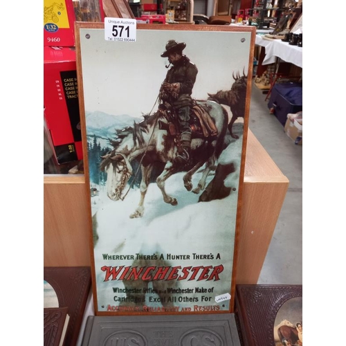 571 - A Winchester rifles metal wall sign and a quantity of time life books and the civil war.