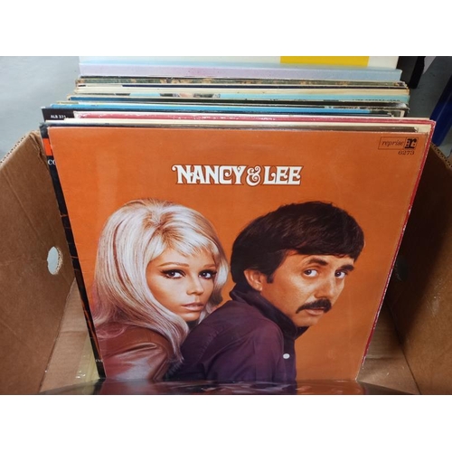 581 - A quantity of LP vinyl records including Johnny Mathis Nat King Cole etc.