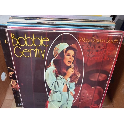 581 - A quantity of LP vinyl records including Johnny Mathis Nat King Cole etc.