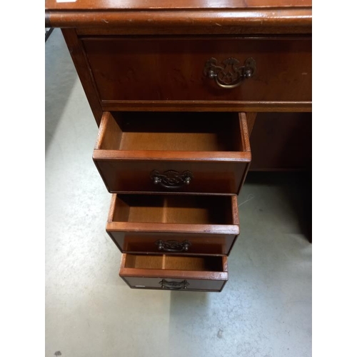 588 - A good mid 20th century walnut pedestal desk with centre door