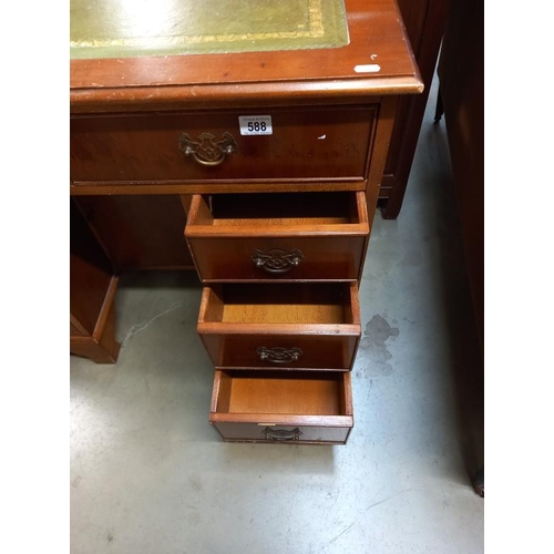 588 - A good mid 20th century walnut pedestal desk with centre door