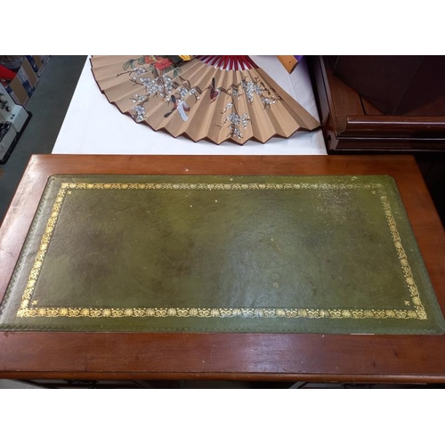 588 - A good mid 20th century walnut pedestal desk with centre door