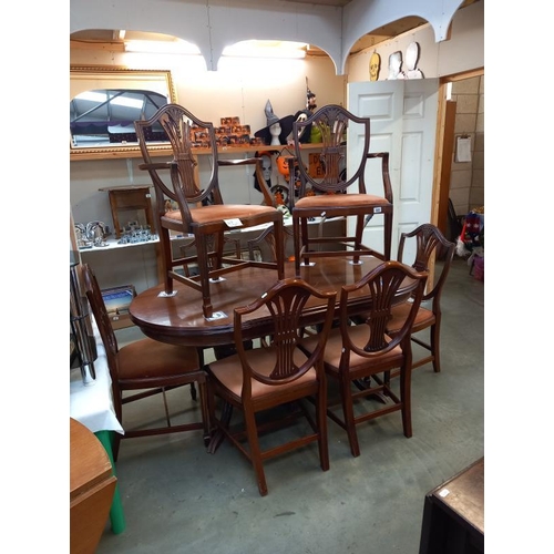 589 - A set of 8 mahogany shield back wheatsheaf dining chairs