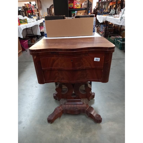 592 - A Victorian mahogany serpentine French fold over table with 2 drawers on centre pedestal lyre base. ... 