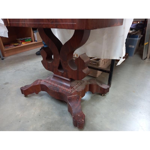 592 - A Victorian mahogany serpentine French fold over table with 2 drawers on centre pedestal lyre base. ... 