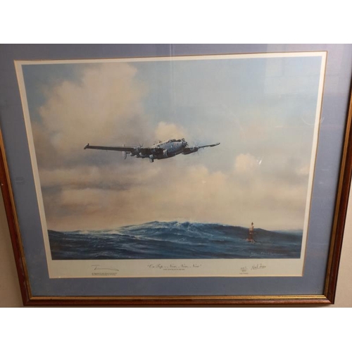 596 - 2 framed and glazed limited edition aircraft prints of an Avro Shackleton and one of Guy Gibson by a... 