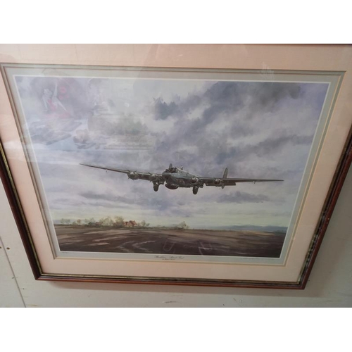 599 - A framed and glazed print of The battle of Britain memorial flight and a signed print of an Avro Sha... 