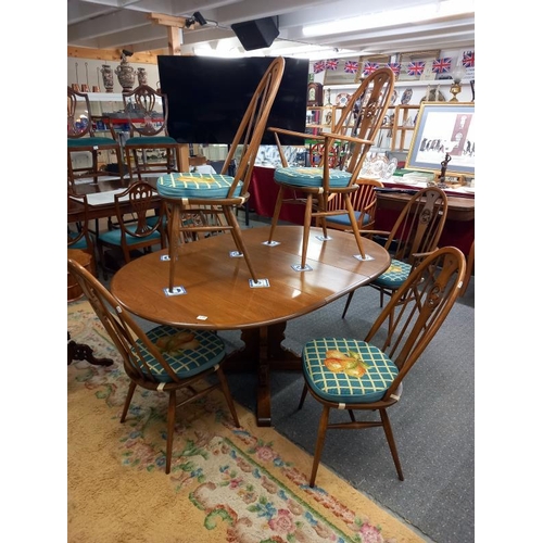 1575 - A good quality Ercol dining table with an extra leaf and six Ercol dining chairs, COLLECT ONLY.