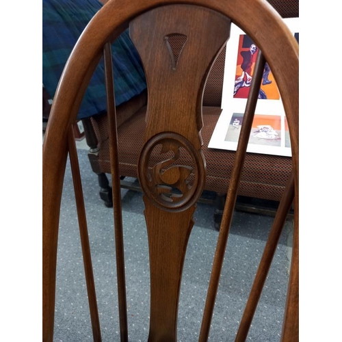 1575 - A good quality Ercol dining table with an extra leaf and six Ercol dining chairs, COLLECT ONLY.