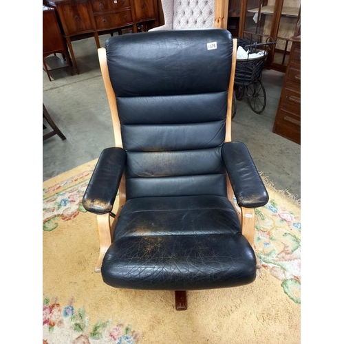 1576 - A retro Swedish model Gute-mobler Nassjo teak framed leather swivel chair.