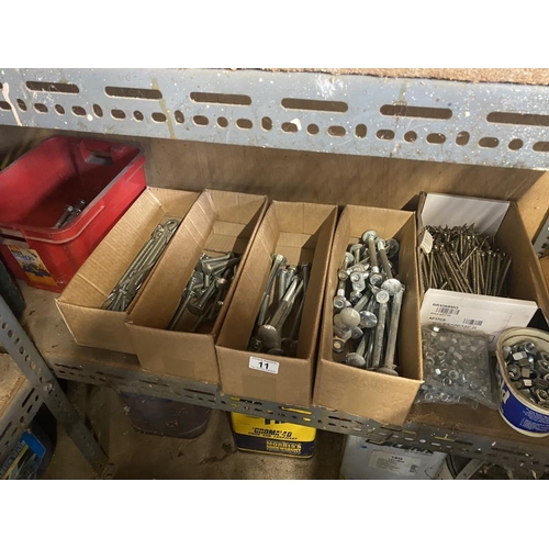 A Shelf of bolts, screws and nails. Collect Only.