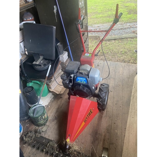 121 - A Lawnflite petrol scythe with Honda GC1354.0 engine. Collect Only.