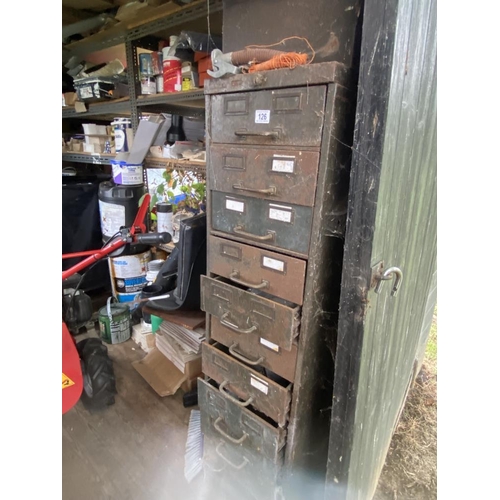 126 - A steel cabinet with drawers, part filled with various ironmongery. Collect Only.