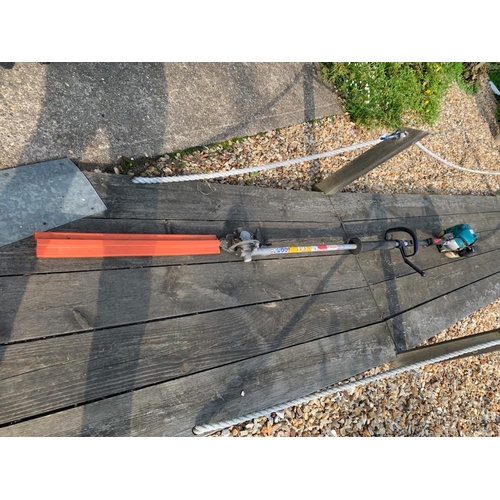 145 - A Makita petrol pole hedge trimmer. Collect Only.