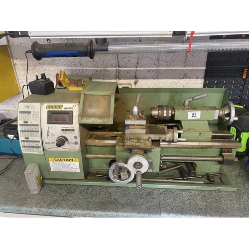 23 - A Warco lathe with large collection of chucks, gears and cutting tools. Collect Only.