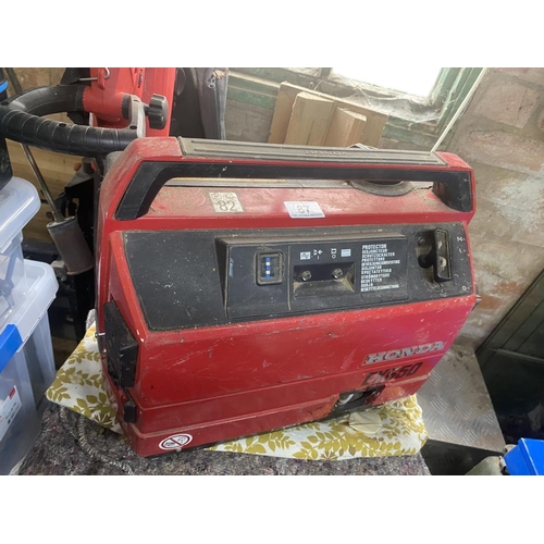 87 - A suitcase generator genuine Honda EX650, runs very quiet. Collect Only.