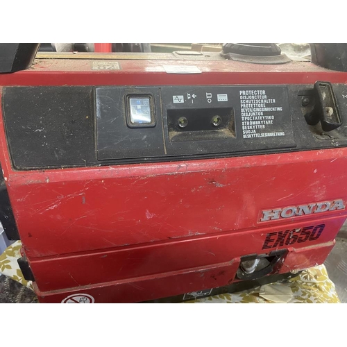 87 - A suitcase generator genuine Honda EX650, runs very quiet. Collect Only.