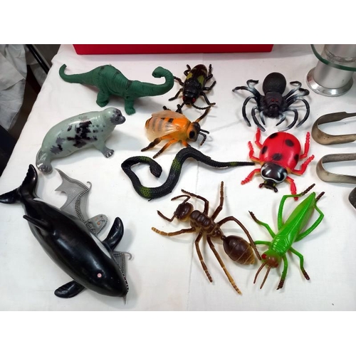 501 - A quantity of hard rubber and plastic animals, including insects, lion, whale, dinosaur, etc.